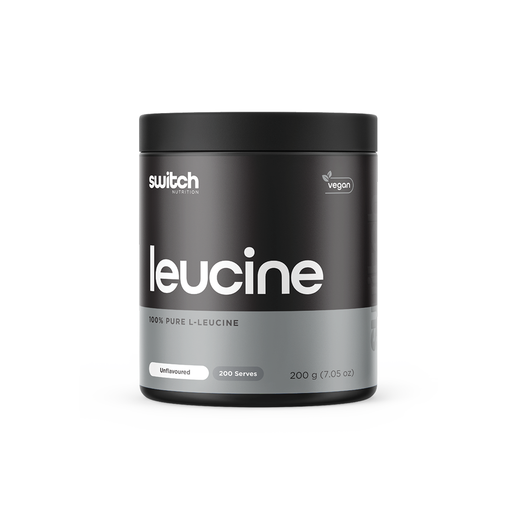 A container of Switch Nutrition's Leucine, featuring 100% pure L-Leucine, unflavoured, offering 200 serves per container. The packaging is black with white text, highlighting the vegan-friendly aspect of the supplement.
