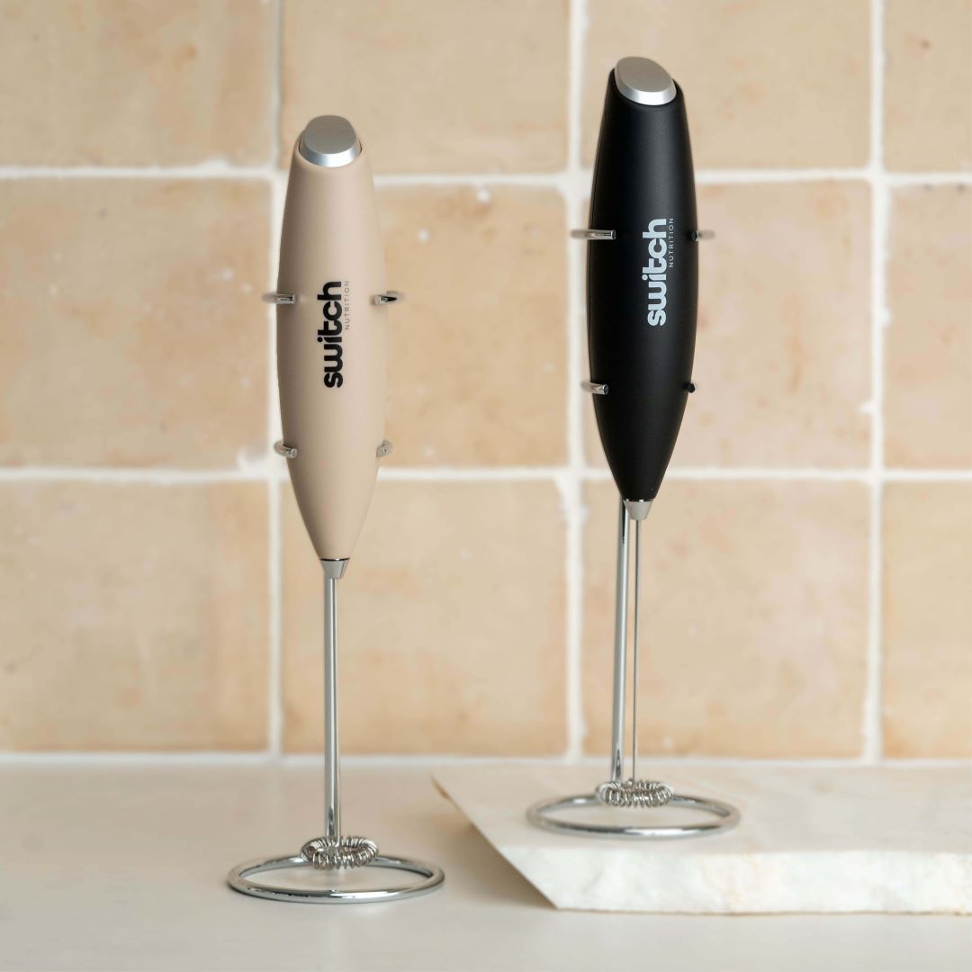Both Hand Blenders on Display: The beige and black hand blenders are displayed side by side on a kitchen counter.