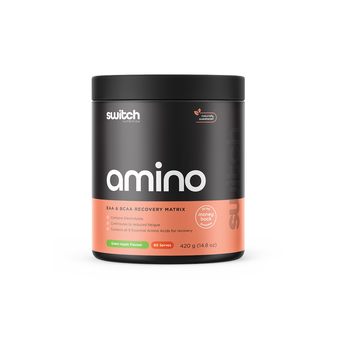 Container of Switch Nutrition's 'amino' in green apple flavor, an EAA & BCAA recovery matrix, which contains electrolytes and all 9 essential amino acids for recovery. The product is naturally sweetened, offers 30 servings, and the weight is 210 grams (7.4 oz) with a 30 day money back guarantee' emblem.