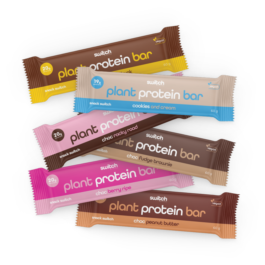 Switch Nutrition Plant Protein Bars in various flavours - Includes bars in Choc Peanut Butter, Cookies and Cream, Choc Rocky Road, Choc Fudge Brownie, Choc Berry Ripe, and Choc Honeycomb. Each bar is 60g, vegan, and offers a different protein content (ranging from 19g to 20g) per flavour. Each bar is wrapped in colour-coded packaging corresponding to its flavour.